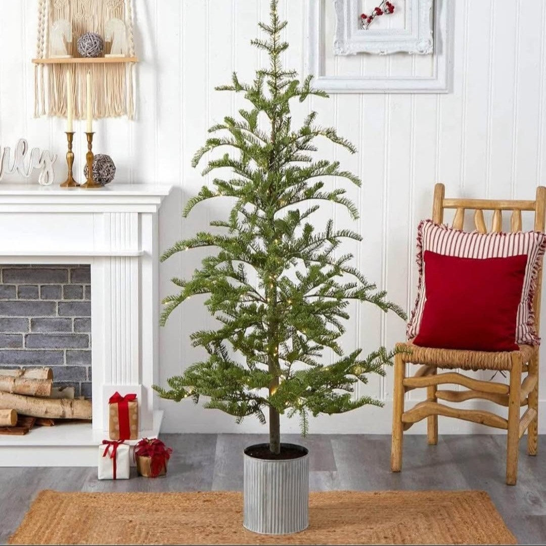 Nearly Natural 5.5ft. Pre-Lit Pine Artificial Christmas Tree in Decorative Planter with 150 Lights