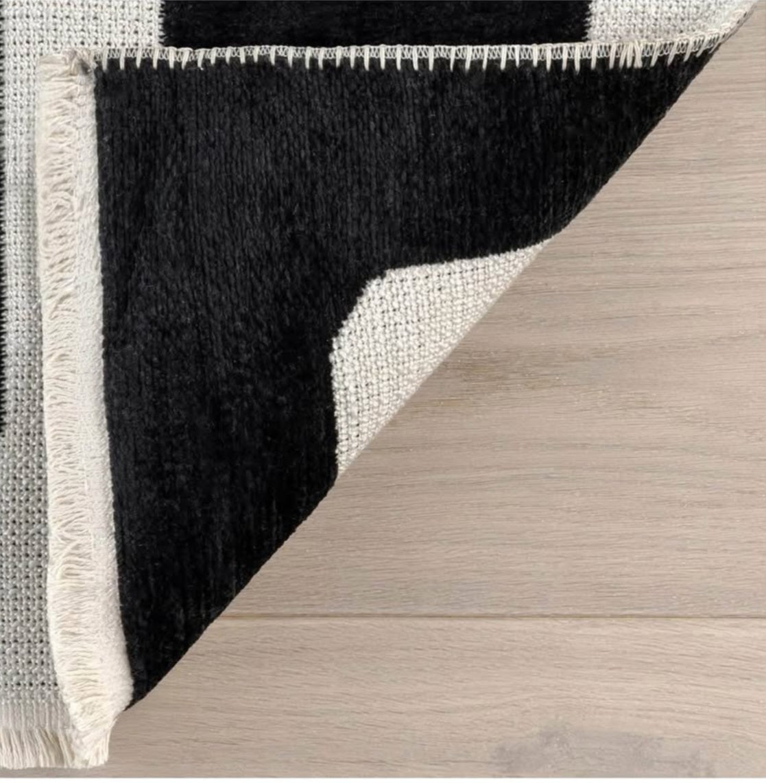 NuLOOM 7'10" x 10' Versa Collection Reversible SuperiorWash Area Rug, Machine Washable, Stain-Resistant, Easy Storage, Oeko-TEX Certified, Rashana Black/Cream