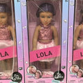 Three identical dolls in packaging labeled 'LOLA' on a store shelf.