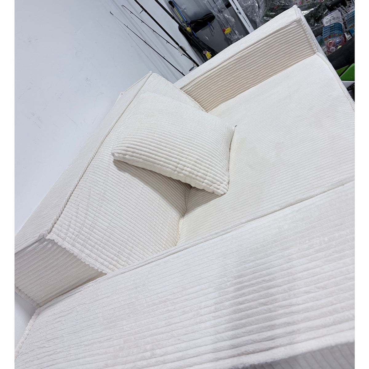 Loveseat boneless, color cream white, one pillow